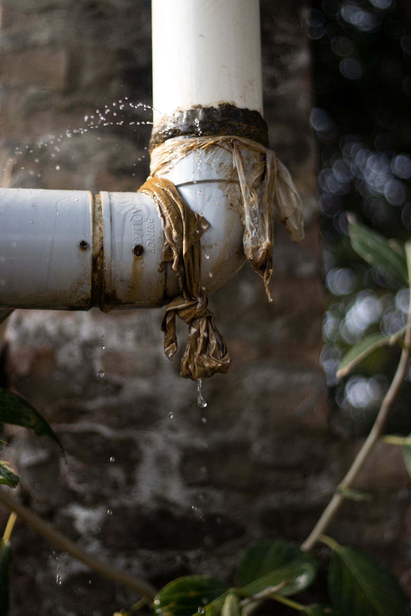 Water leaking from a pipe joint